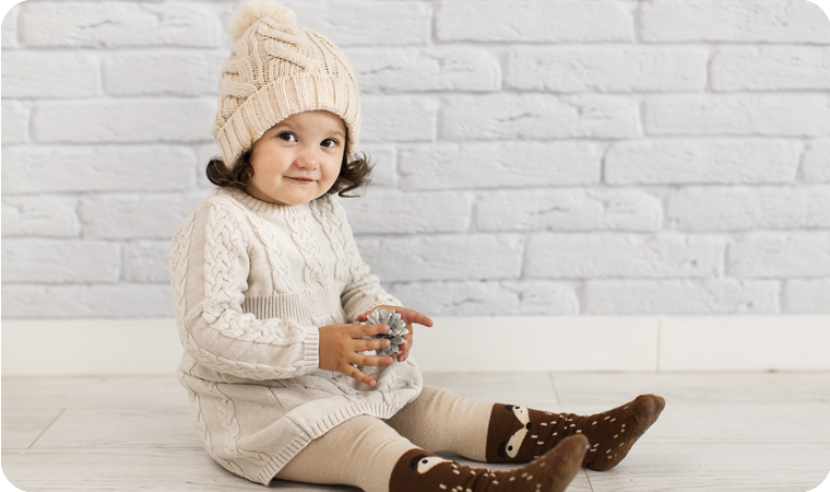 Child wearing warm organic cotton clothing